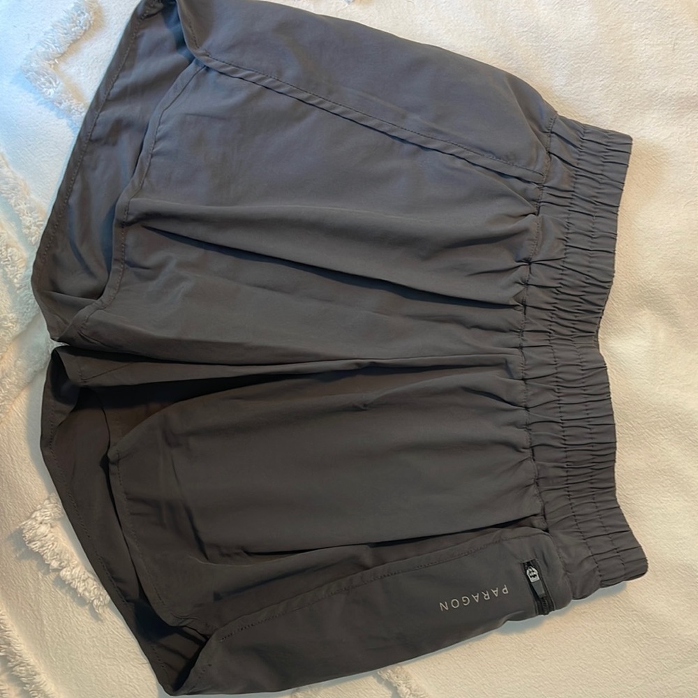 Paragon high rise track shorts. Like new. Not available online anymore.